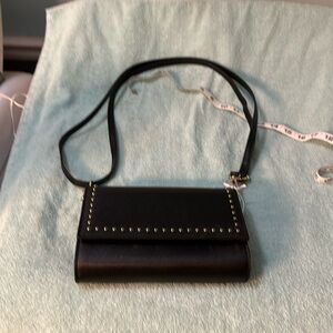 NWT cross body tech purse.